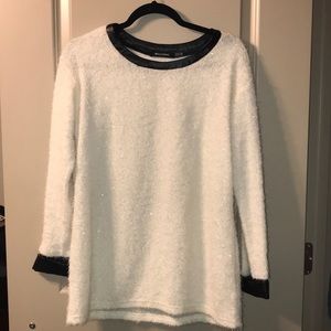 Sweater with black leather trim
